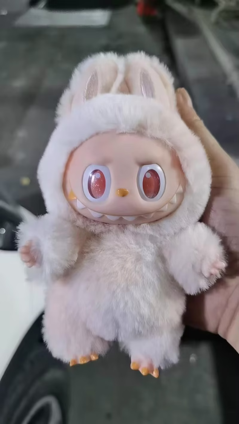 The Labubu Action Figure Plush Keychain is a Bubble Doll from the New Third Generation Monster Have A Seat Blind Box Series, Kids’ Toy Gift - Image 3