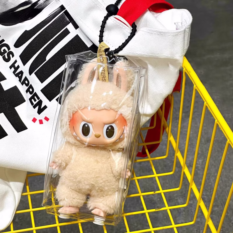 With the signature Labubu style, the Fashion Rainproof PVC Transparent Doll Carrying Bag will protect and give style to your 17cm miniature figures.