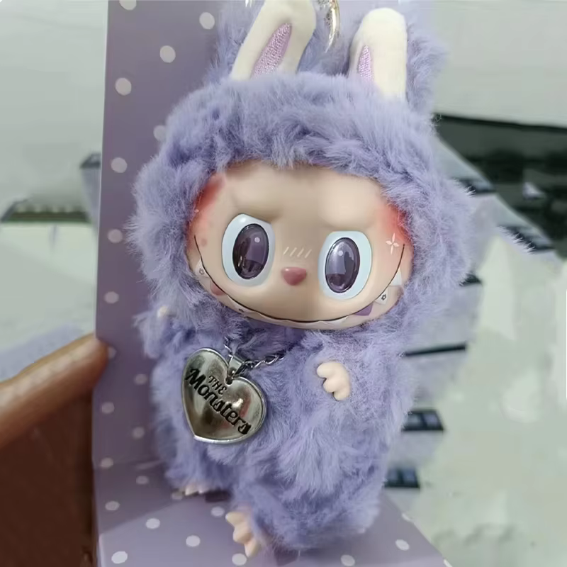 With its unique design, Monsters Face Doll Ornaments Bag Pendant presents LABUBU Zimomo Taro Paste LAFUFU Girl Surprise Toy