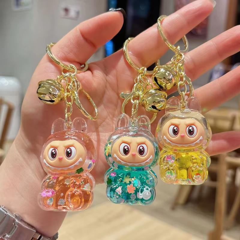 Adorable Kawaii Floating Flash Labubu Keychain, Liquid Transparent Acrylic Keychain, and Labubu Monster Decoration